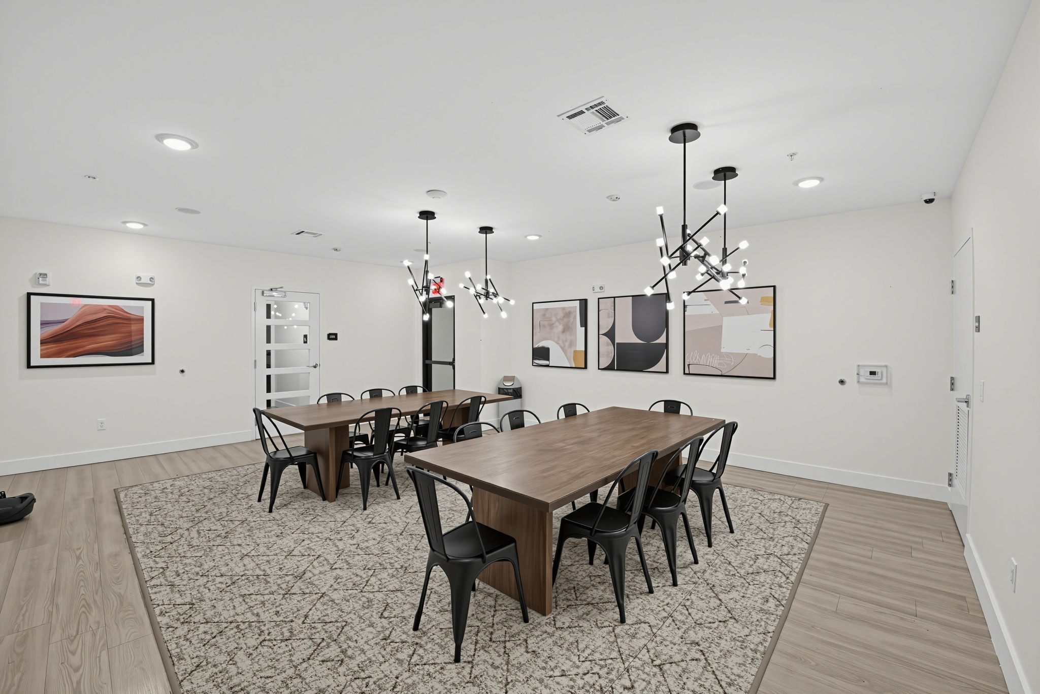 Social Spaces with Group Tables at Flare Student Apartments in Tempe, AZ