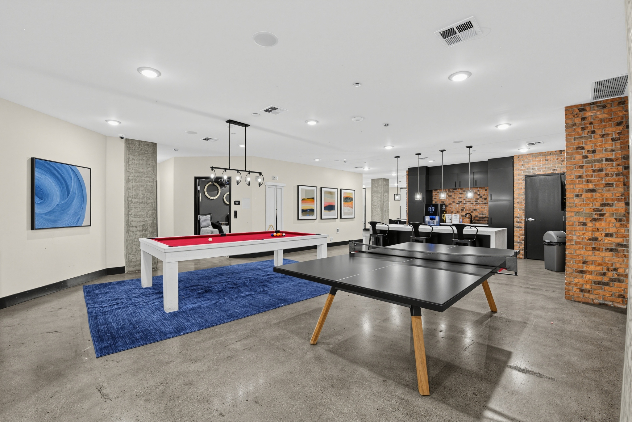 Club Room with Billiards and Ping Pong Tables at Flare Student Apartments in Tempe, AZ