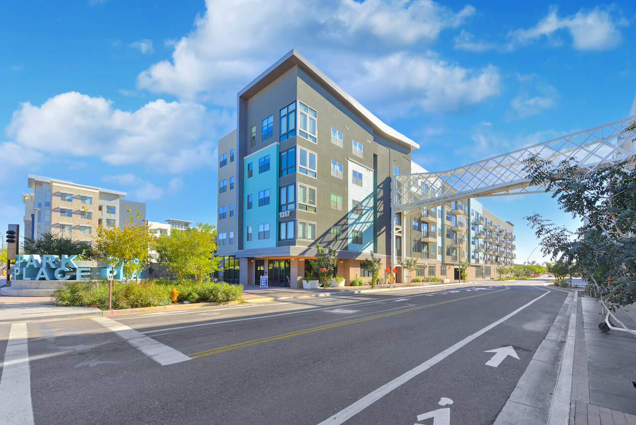 Modern apartment buildings with a pedestrian bridge