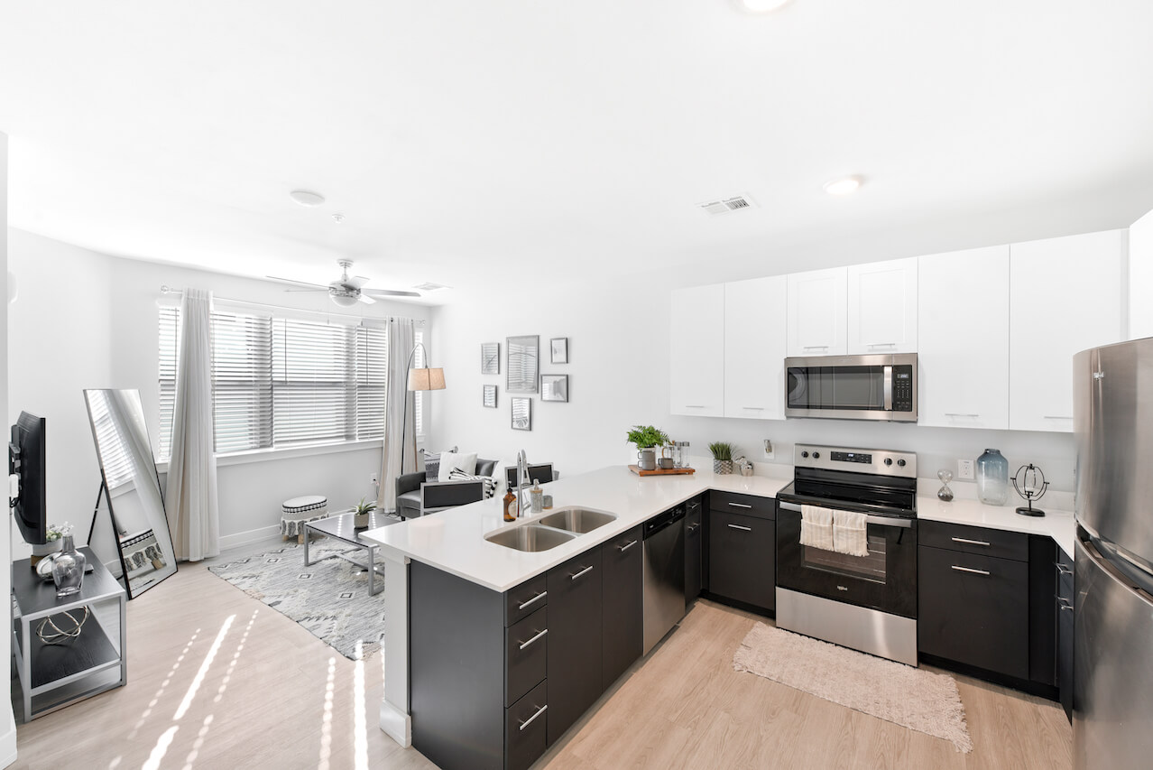 Modern kitchen and living area with sleek decor