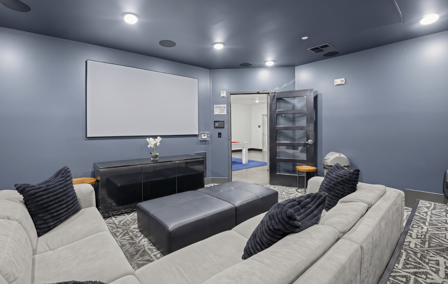 Movie Theater with Lounge Seating at Flare Student Apartments in Tempe, AZ